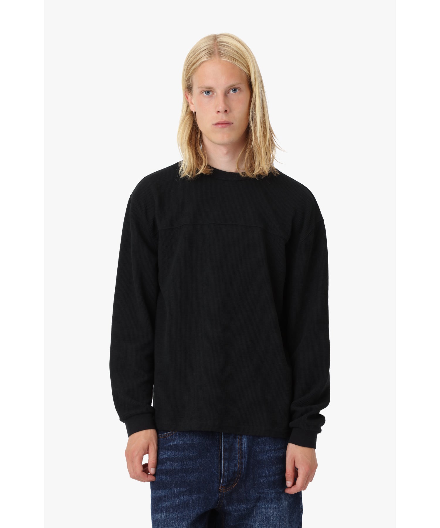 Model wearing black cotton waffle long sleeve, 188 cm tall in size M