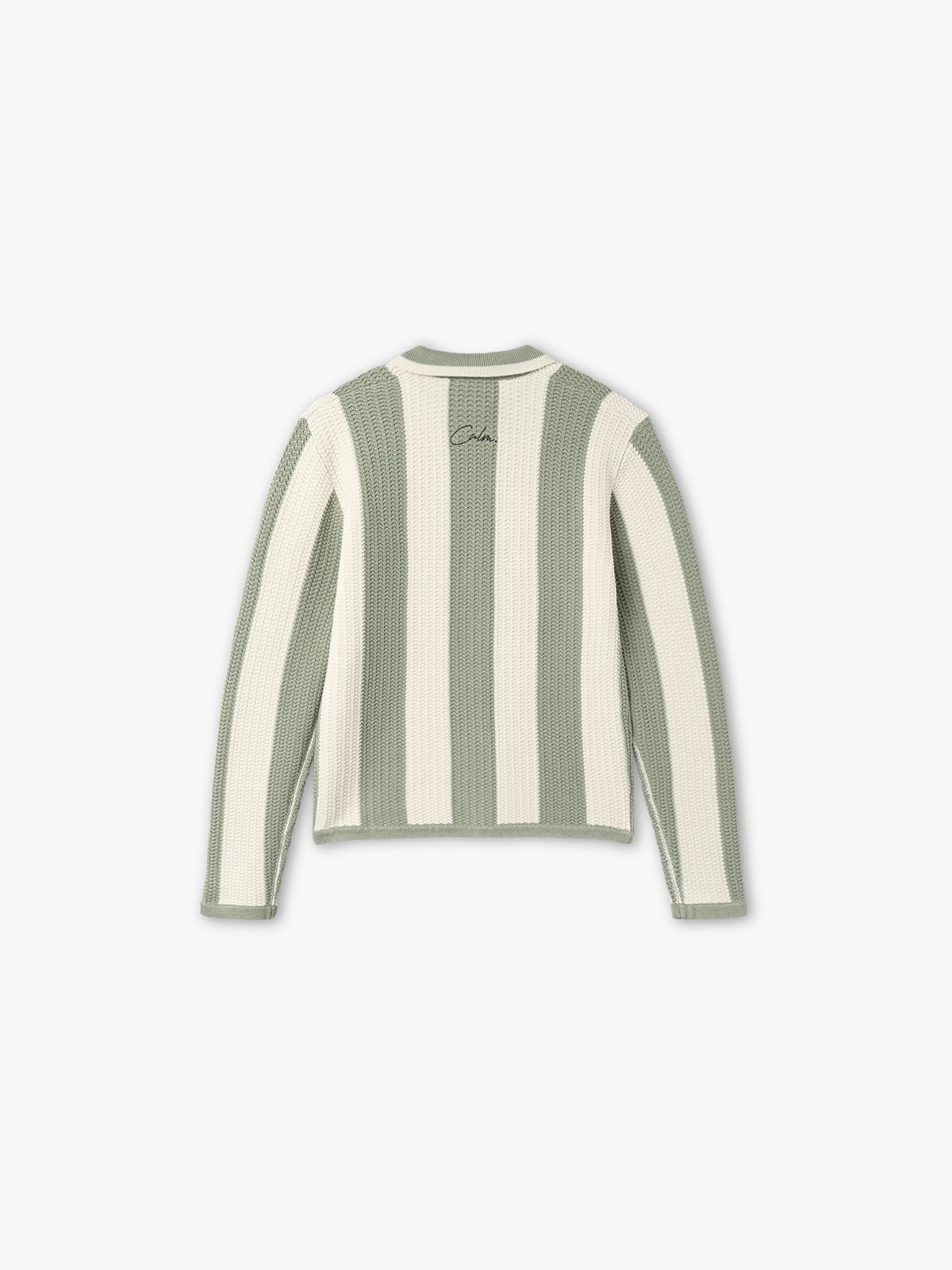 Uptown knitted polo in green seen from the back