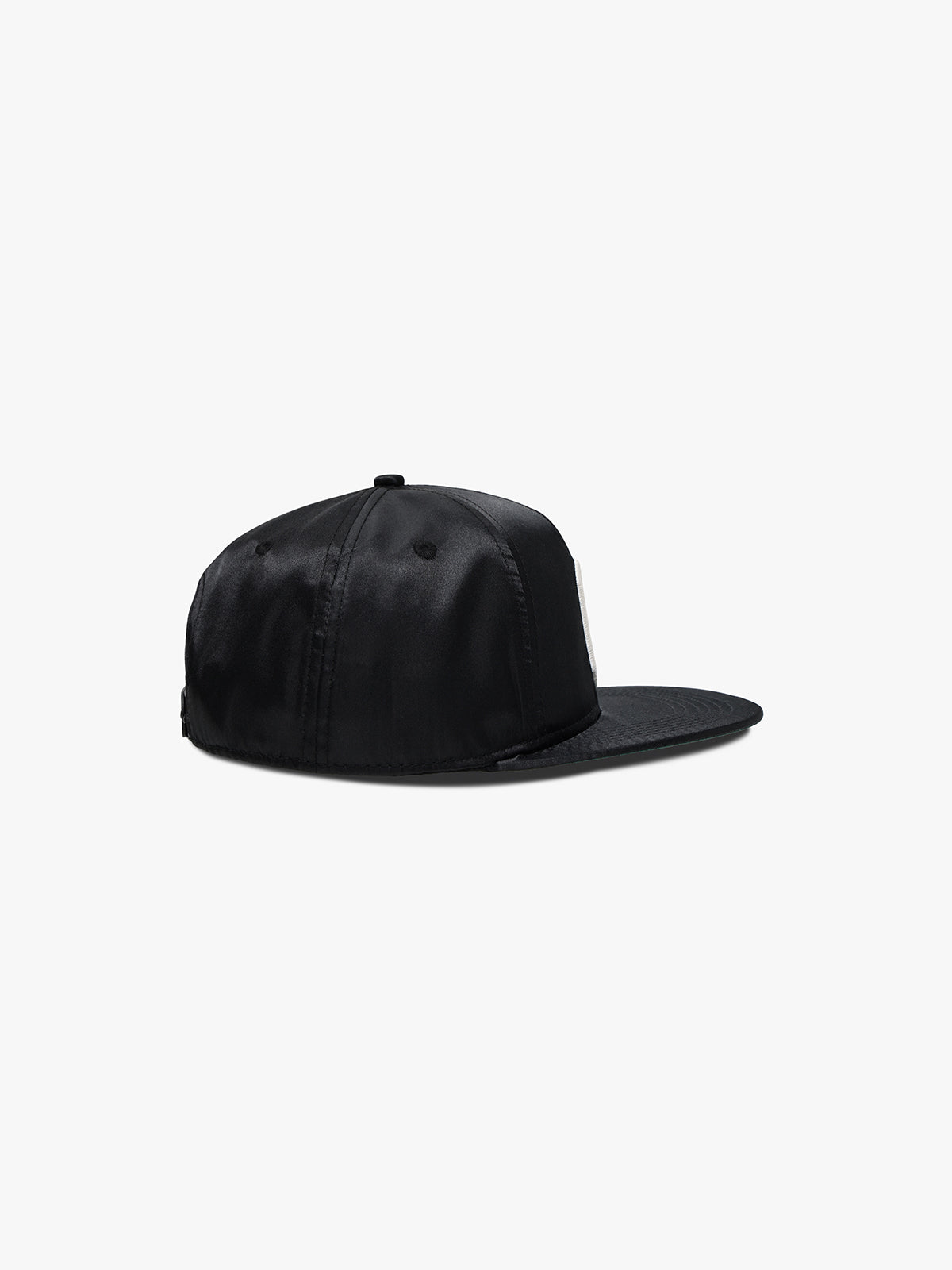 Black satin baseball cap seen from the side